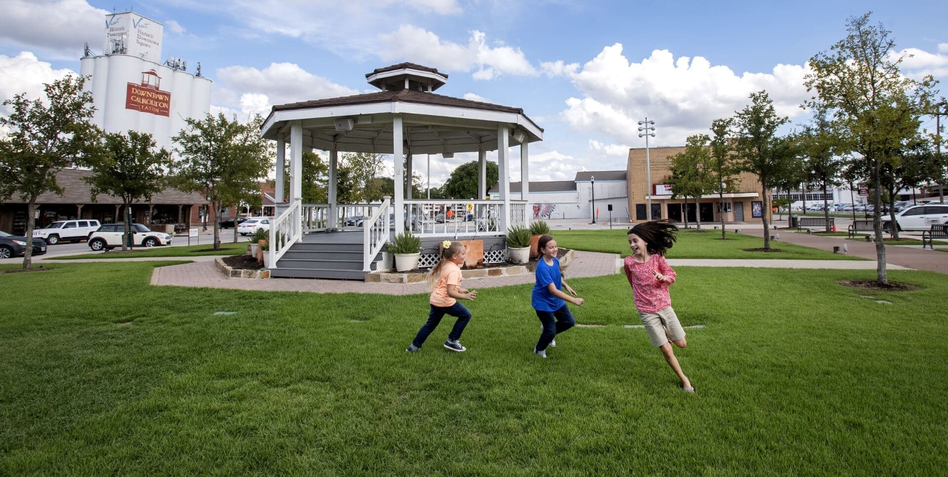 Crew members finishing a commercial concrete pour in Carrollton, TX.