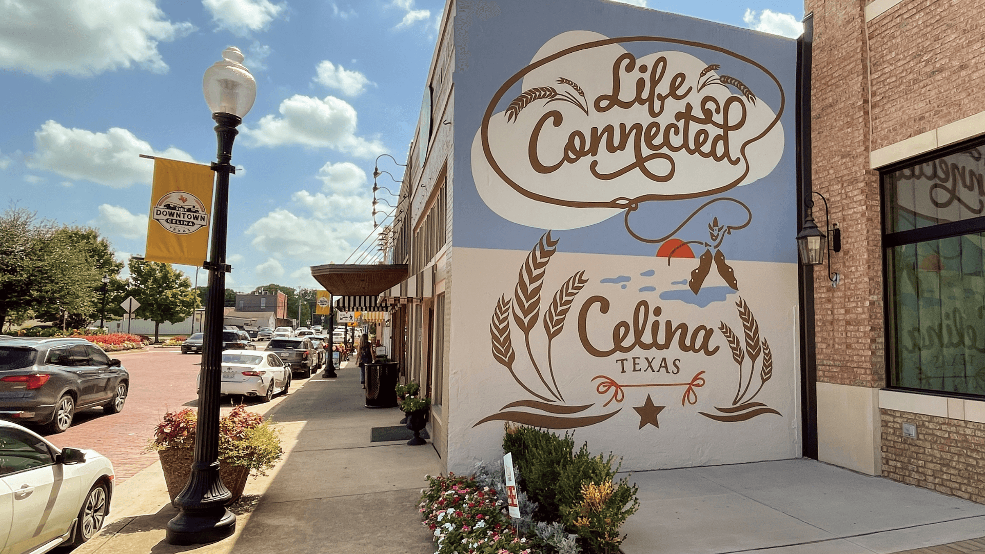 Crew members finishing a commercial concrete pour in Celina, TX.
