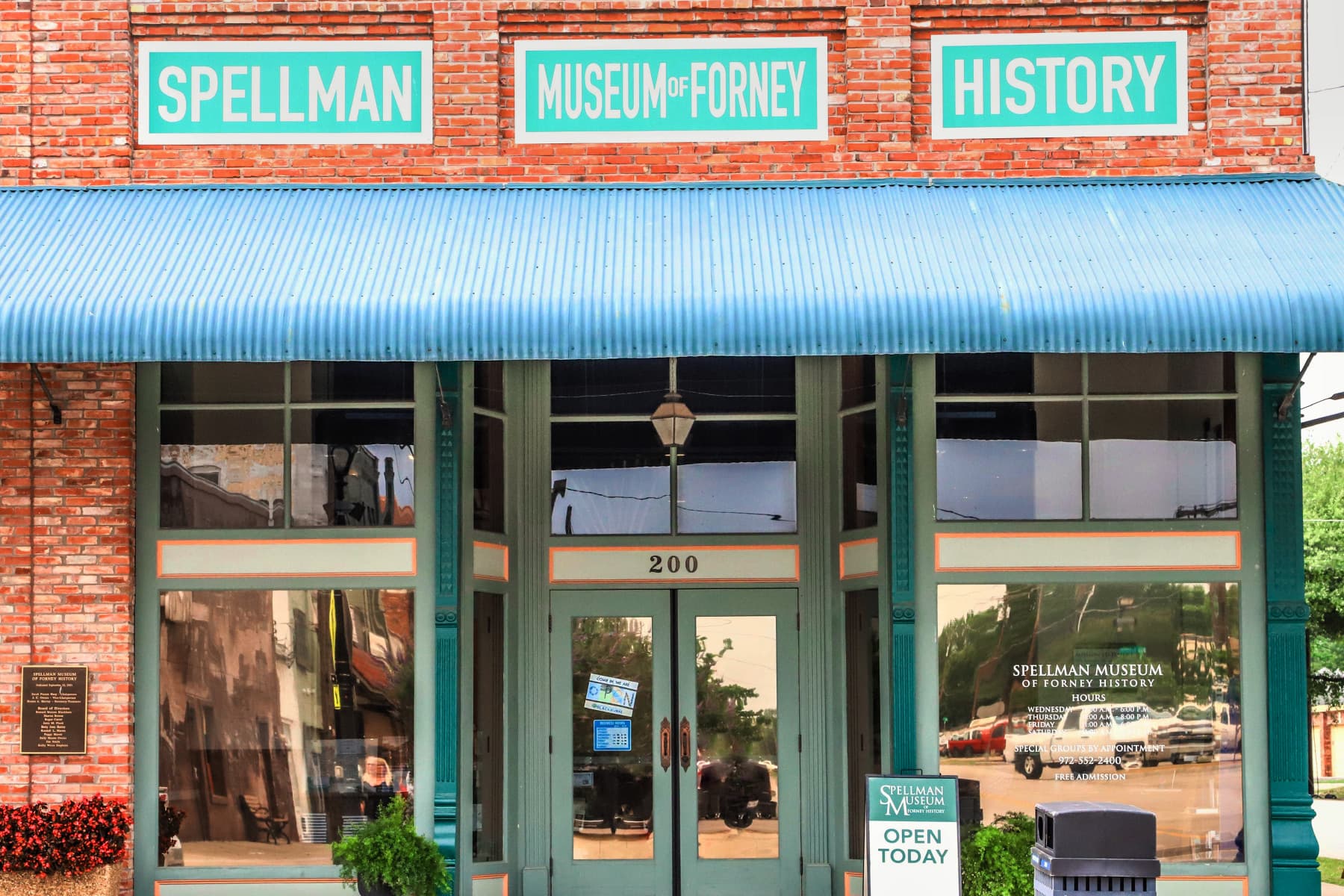 Crew members finishing a commercial concrete pour in Forney, TX.