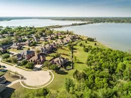 Crew members finishing a commercial concrete pour in Garland, TX.