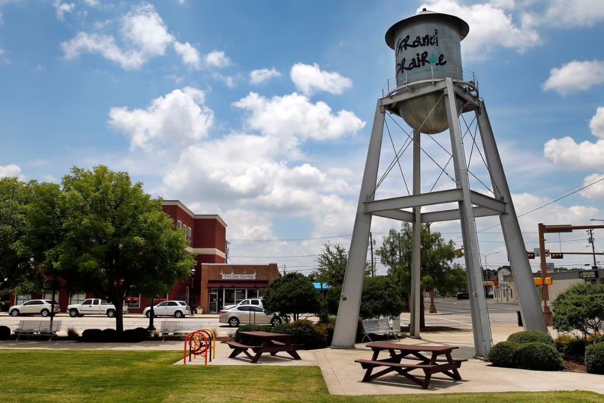 Crew members finishing a commercial concrete pour in Grand Prairie, TX.