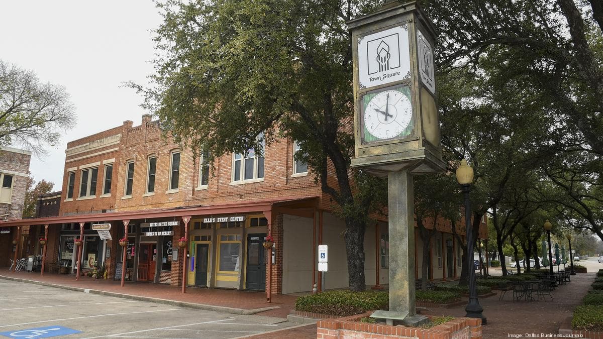 Crew members finishing a commercial concrete pour in Lancaster, TX.