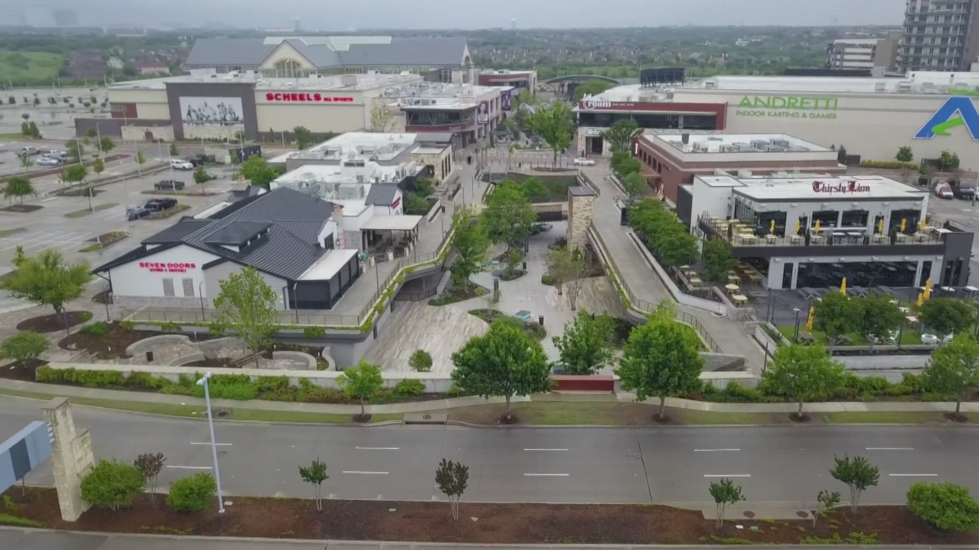 Crew members finishing a commercial concrete pour in Little Elm, TX.