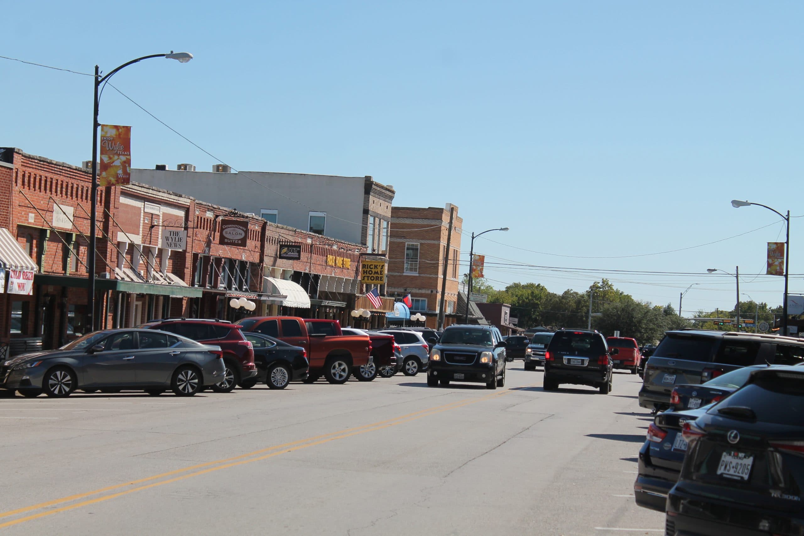 Crew members finishing a commercial concrete pour in Melissa, TX.