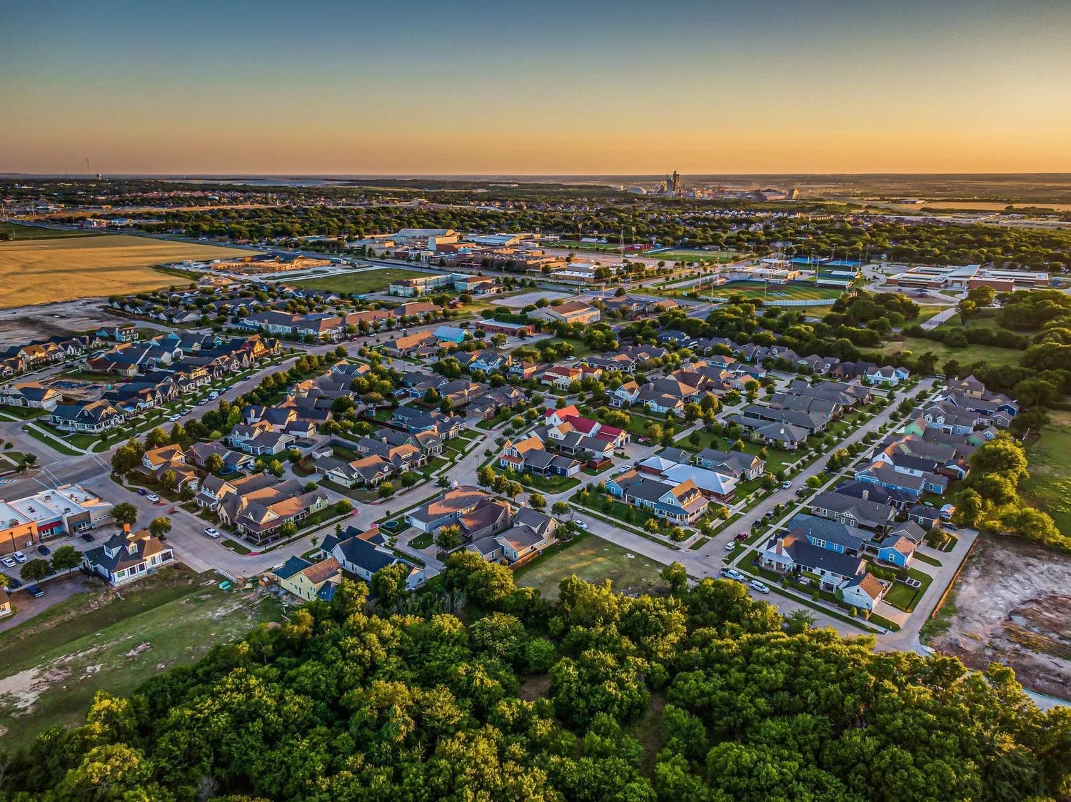 Crew members finishing a commercial concrete pour in Midlothian, TX.