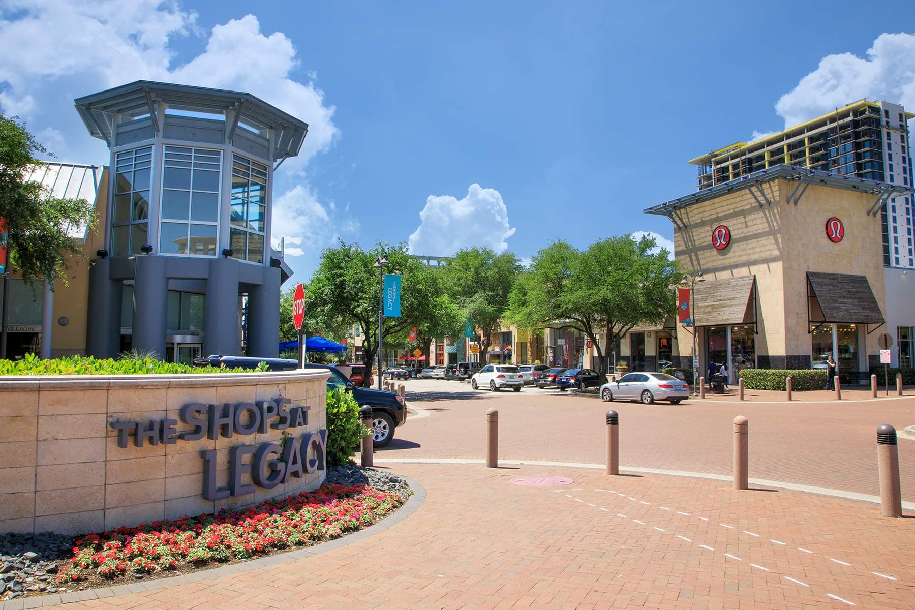 Crew members finishing a commercial concrete pour in Plano, TX.