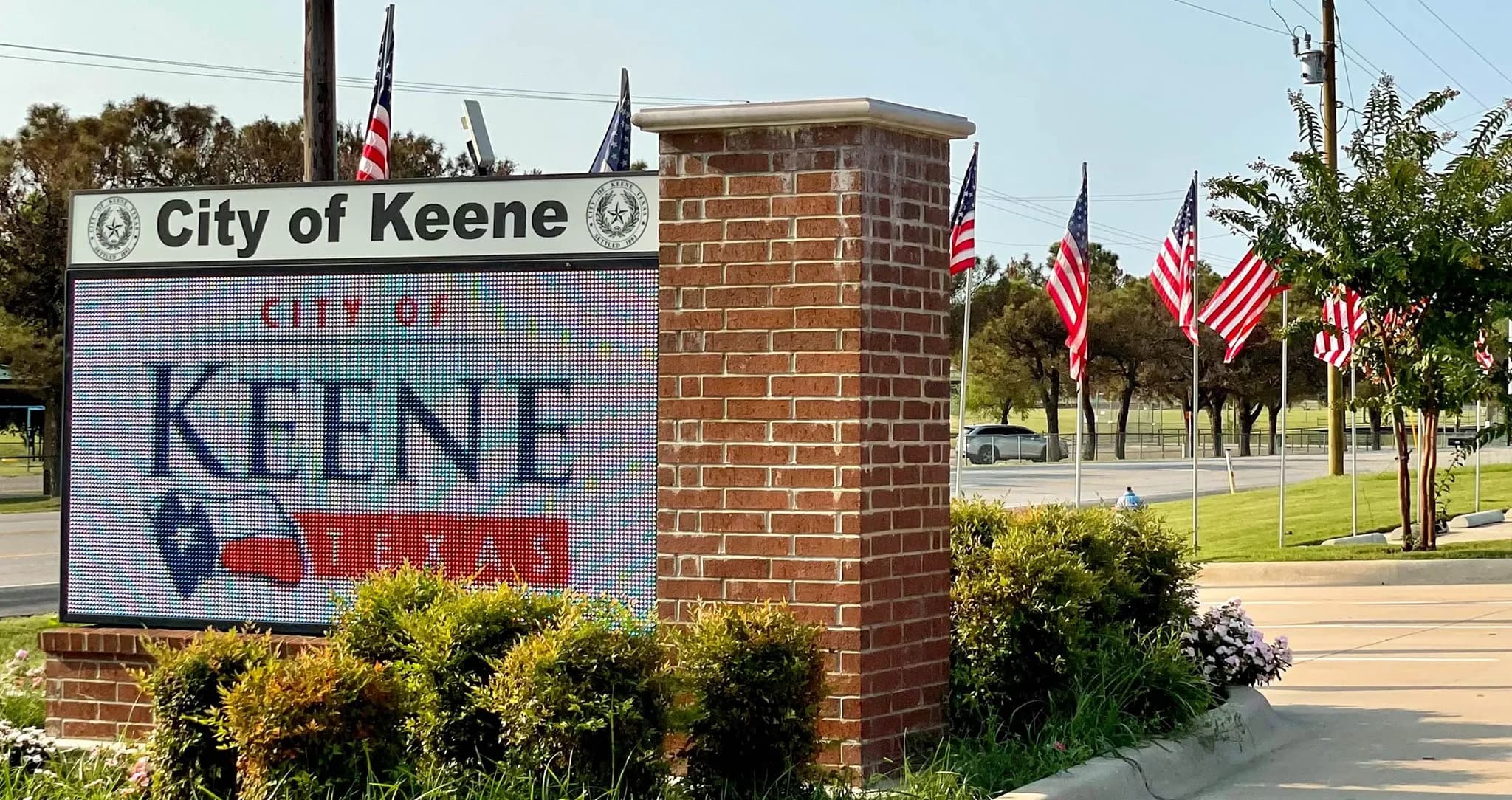 Crew members finishing a commercial concrete pour in Sachse, TX.